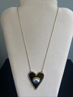 Gold Heart Pendant Necklace with Black Enamel and Blue Eye Accent
